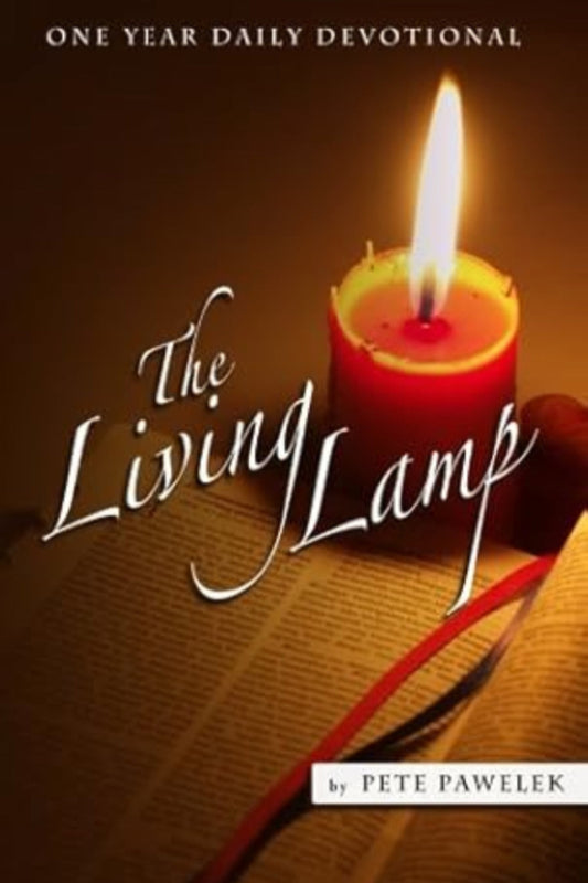 Book cover of 'The Living Lamp' with a lit candle on an open book